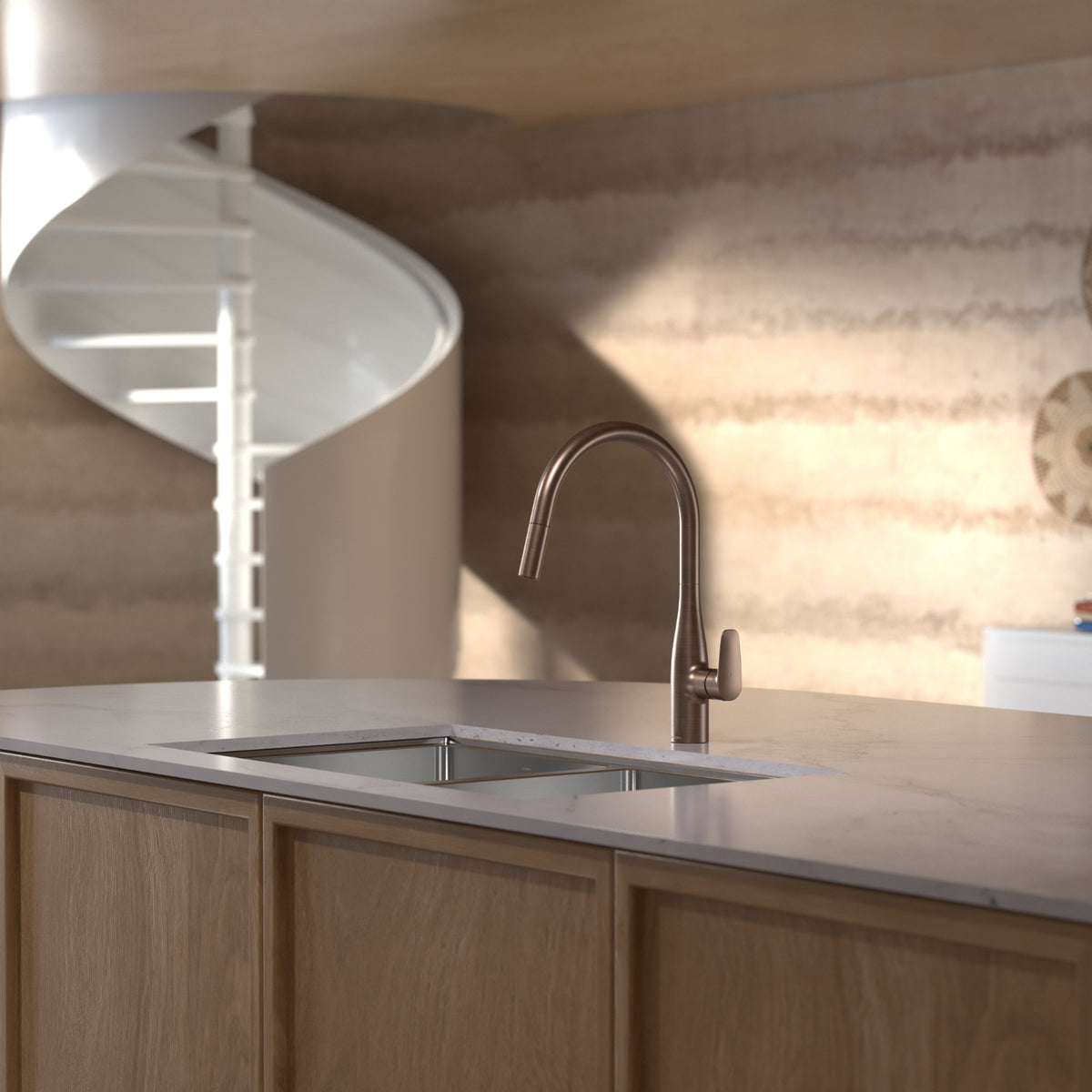 Caroma Contura II pull out sink mixer in brushed bronze on a kitchen benchtop, shown in a lifestyle setting