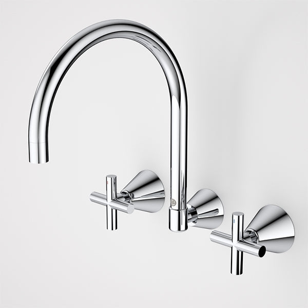 Caroma Coolibah Classic chrome 3 piece laundry tap set with cross handles and swivel gooseneck spout on white background