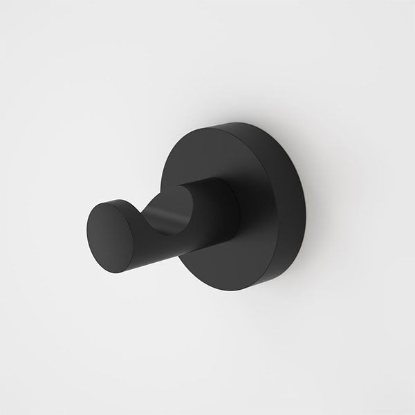 Caroma Cosmo black metal robe hook on round wall plate, minimalist bathroom wall hook