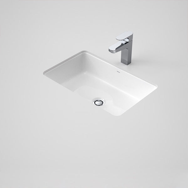Caroma Cube 500 gloss white rectangular under counter basin with chrome waste and no tap hole, shown with mixer tap