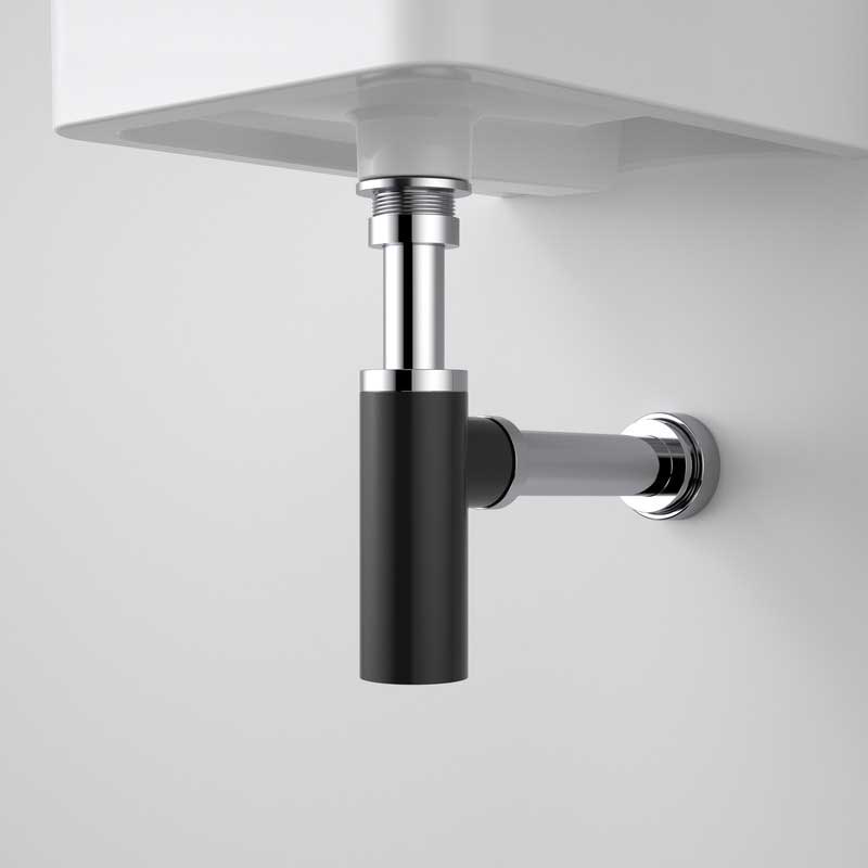 Caroma 40mm bottle trap in matte black and chrome, shown under a wall-hung basin with exposed plumbing