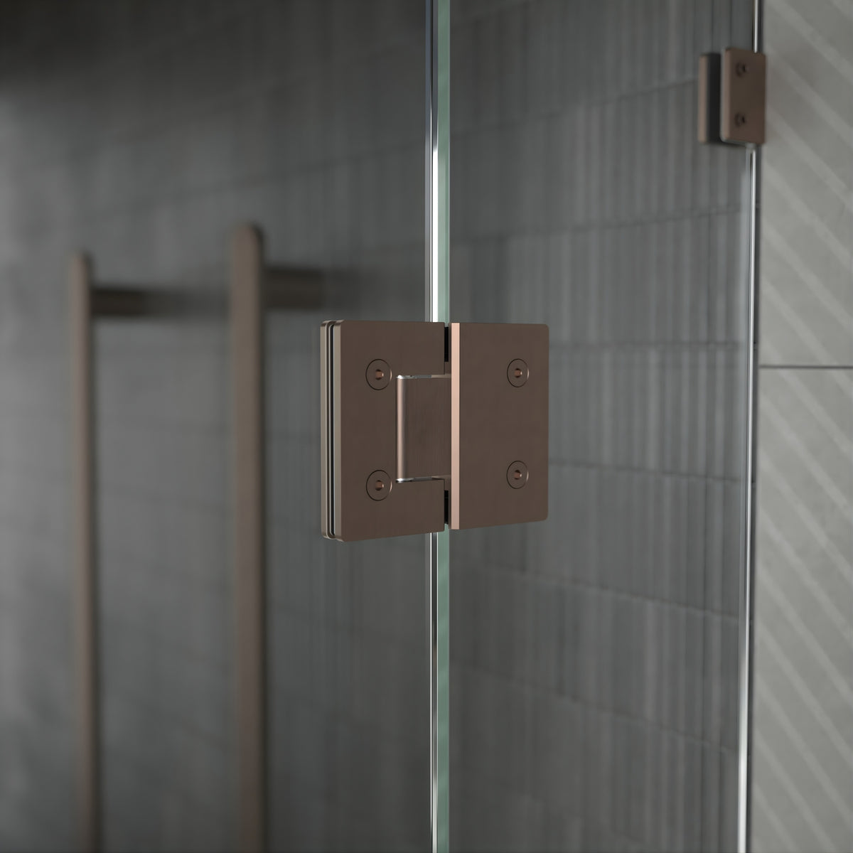 Caroma glass-to-glass shower door hinge in brushed bronze, fitted to frameless glass shower panels