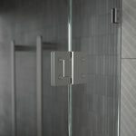 Caroma polished stainless steel glass to glass shower door hinge fitted to two frameless glass panels in bathroom setting
