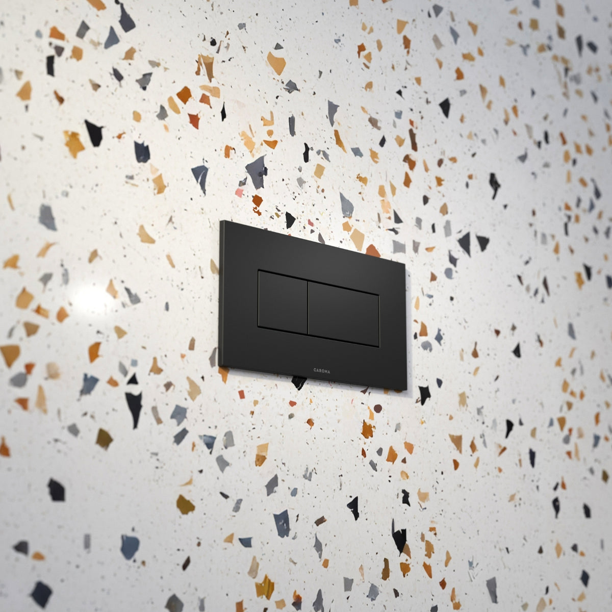 Caroma Invisi Series II matte black rectangular dual flush plate with twin buttons on a wall-mounted cistern panel