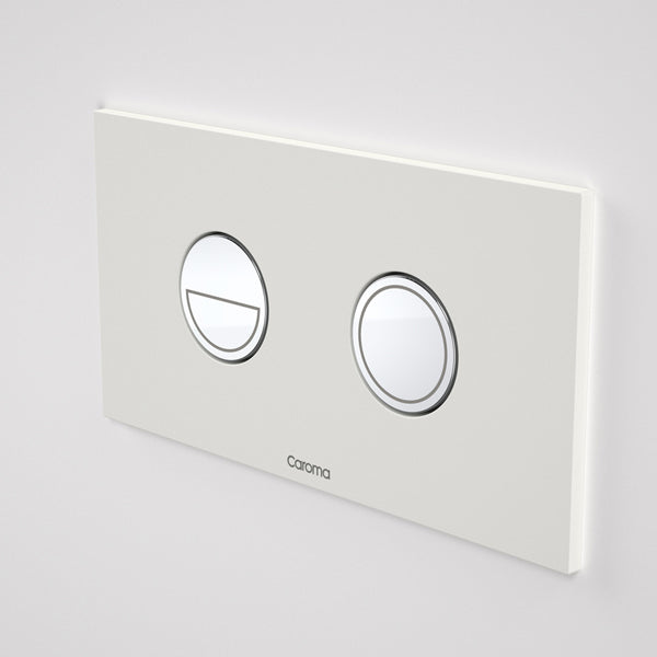 Caroma Invisi Series II round dual flush flush plate, matte white with chrome buttons, wall-mounted view