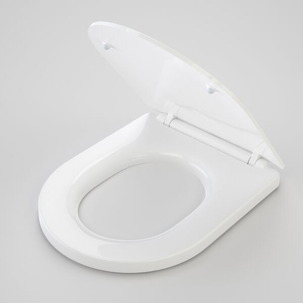 Caroma Liano toilet seat in white, open on a grey background, shown in a top angled view with soft-close hinge