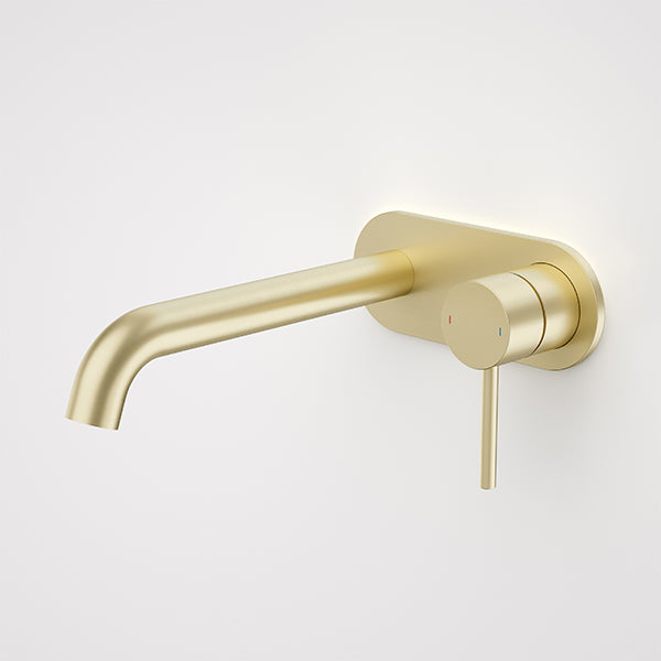 Caroma Liano II wall basin/bath mixer set in brushed brass, with round wall plate and 175mm spout