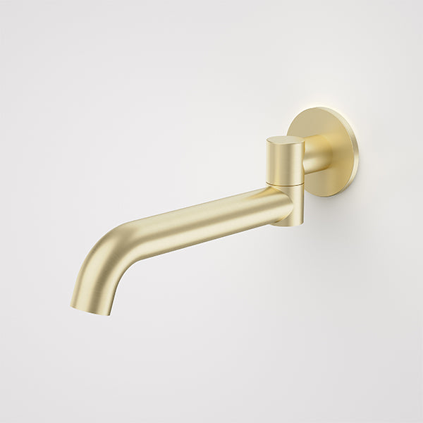 Caroma Liano II wall-mounted bath swivel outlet in brushed brass, slimline curved spout on round wall plate