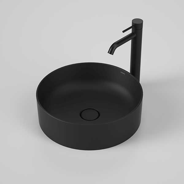 Caroma Liano II round above counter basin in matte black, with black mixer tap, shown front on