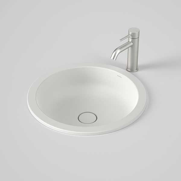 Caroma Liano II round matte white under/over counter basin with ceramic pop-up waste and tap hole visible