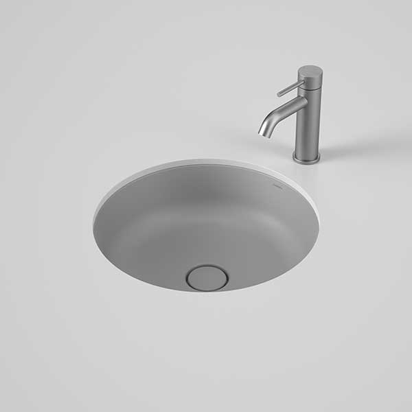 Caroma Liano II round matte grey under-counter basin with matching plug and waste, shown with mixer tap