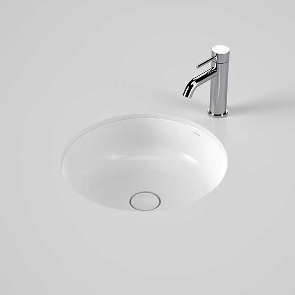 Caroma Liano II round white under/over counter basin with chrome mixer tap shown on a clean benchtop