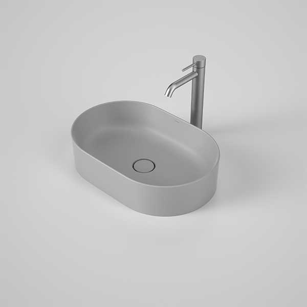 Caroma Liano II pill above counter basin, matte grey oval ceramic with matching pop-up waste, front angle