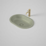 Caroma Liano II matte green oval under/over counter basin with matching waste and gold tap shown in top view