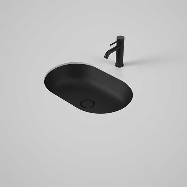 Caroma Liano II oval under counter basin in matte black with matching black tap, top view on grey background