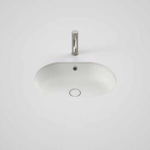 Caroma Liano II matte white oval basin with overflow and tap hole, top view on white background