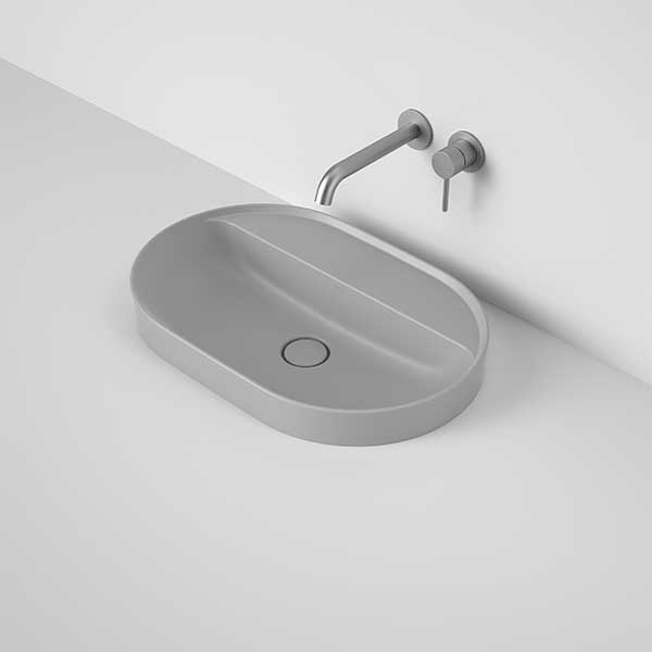 Caroma Liano II pill inset basin in matte grey with tap landing and no tap hole, shown with wall-mounted mixer