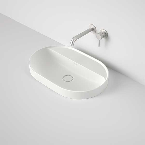 Caroma Liano II matte white pill inset basin with tap landing and wall-mounted mixer, oval ceramic bathroom basin