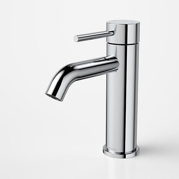 Caroma Liano II chrome basin mixer tap with slim cylindrical body and curved spout on white background