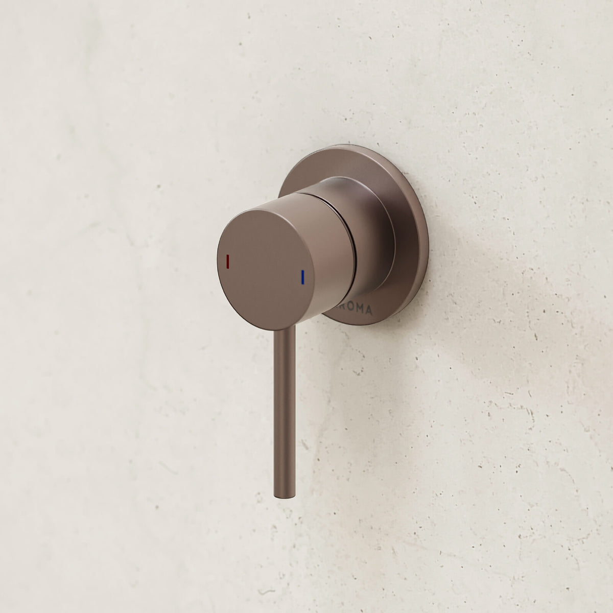 Caroma Liano II wall-mounted bath/shower mixer with round cover plate in brushed bronze on a light tiled wall