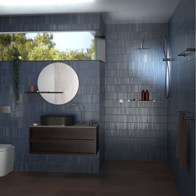 Caroma Liano II Chrome twin shower with overhead rain shower and hand shower in a blue tiled bathroom