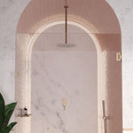 Caroma Liano II brushed bronze hand shower in a walk-in shower, with round shower head and matching arm.