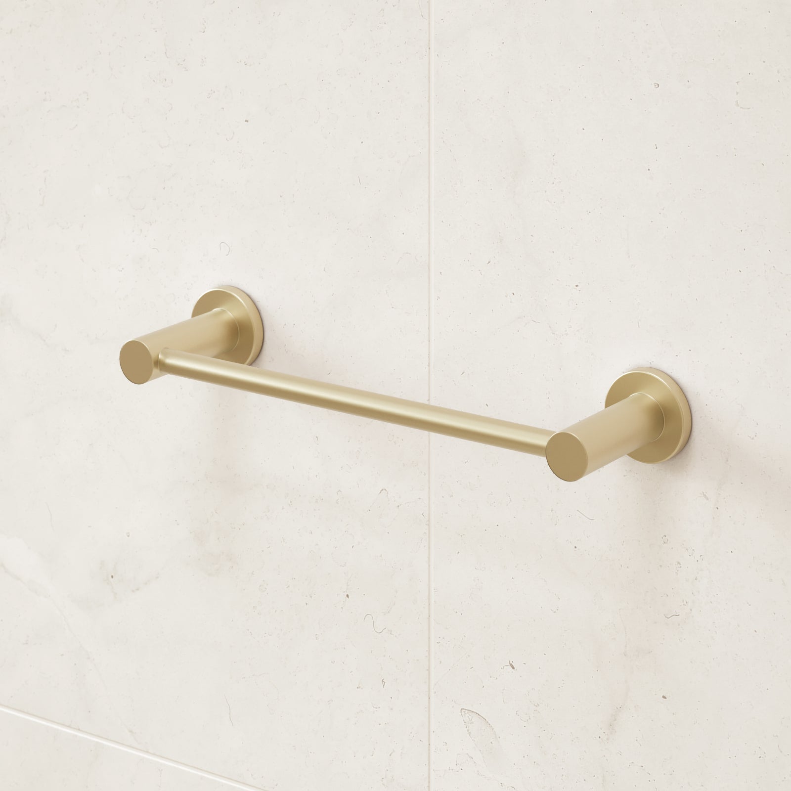 Caroma Liano II brushed brass hand towel rail mounted on a light stone bathroom wall
