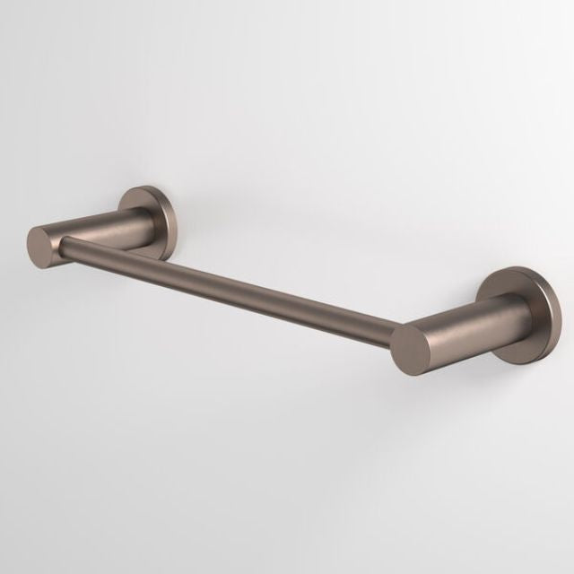Caroma Liano II brushed bronze hand towel rail with round wall plates, mounted on a white wall