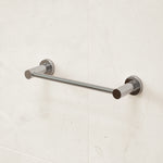Caroma Liano II chrome hand towel rail on wall, minimalist stainless steel bathroom accessory