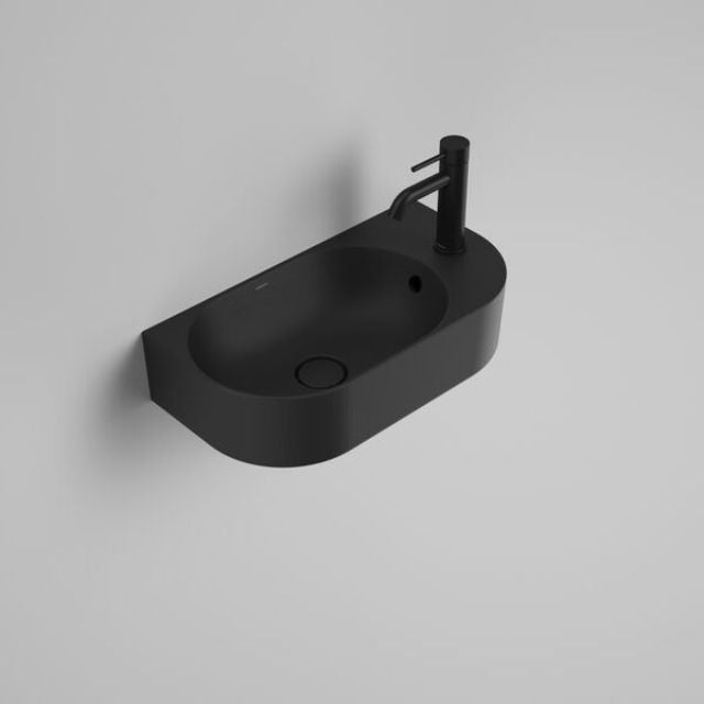 Caroma Liano II wall-hung hand basin, matte black oval ceramic, one tap hole with overflow and mixer tap