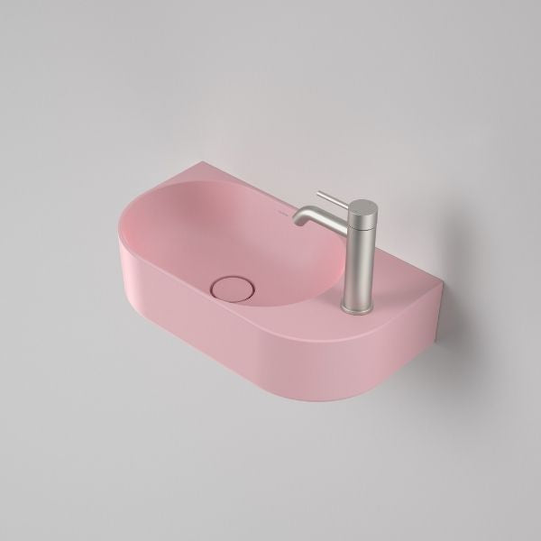 Caroma Liano II matte pink wall-hung oval hand basin with one tap hole and slim rim