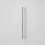Caroma Liano II vertical heated towel rail in brushed nickel, single round bar on a white background