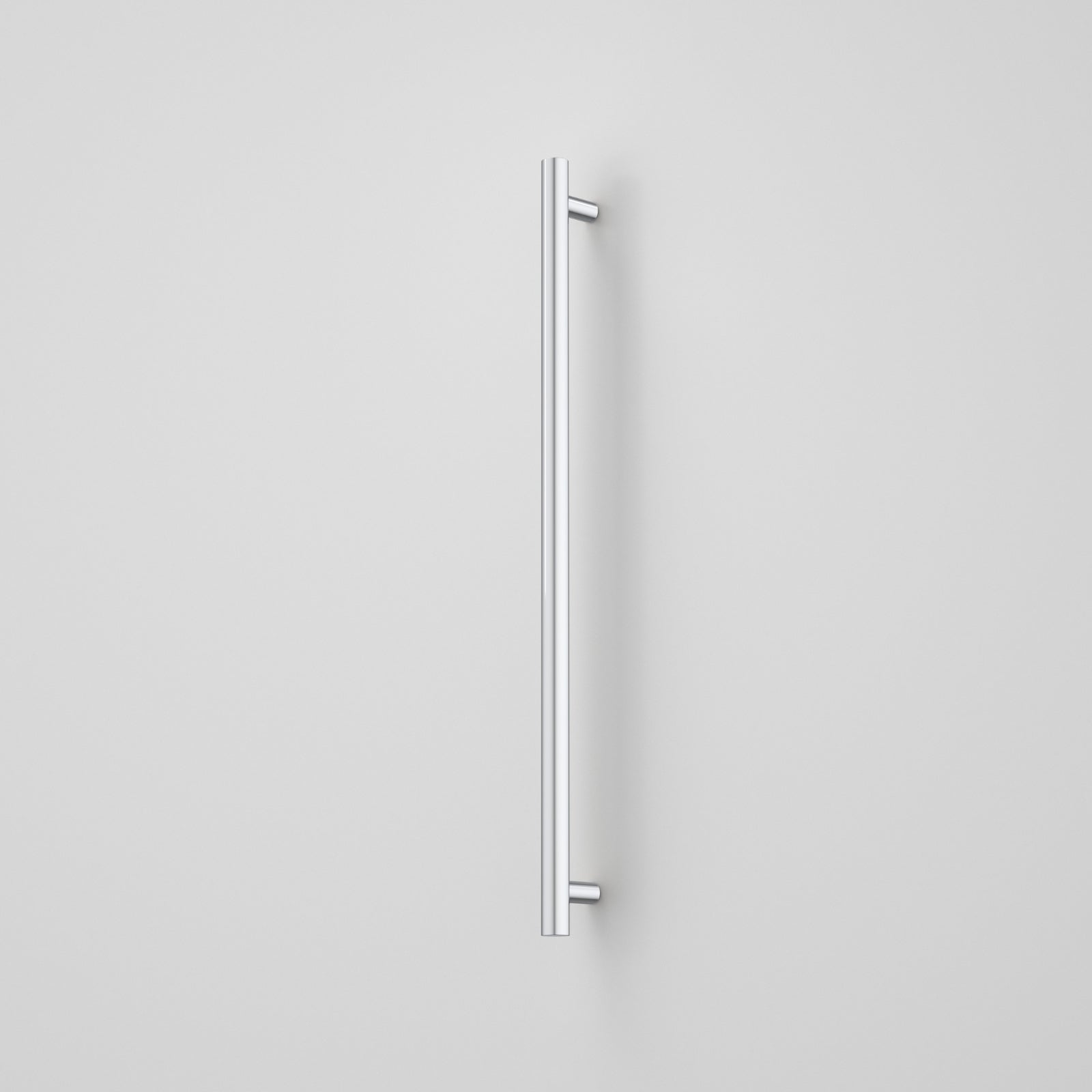 Caroma Liano II vertical heated towel rail in polished stainless steel, single round bar with towel hook detail on a grey wall