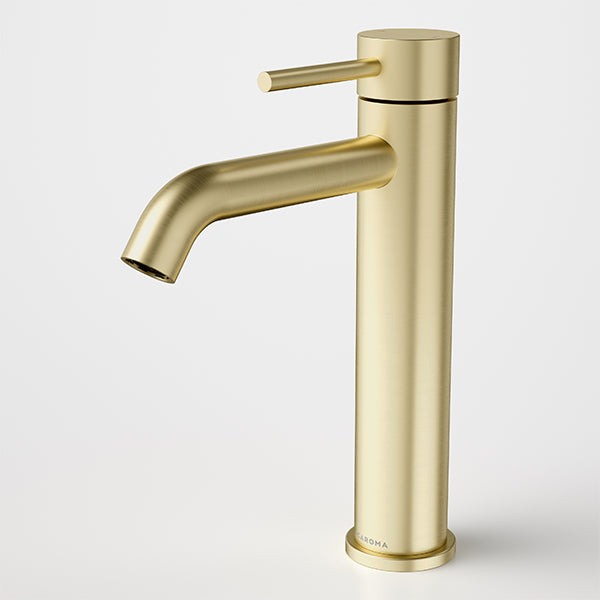 Caroma Liano II mid tower basin mixer in brushed brass, side view on white background
