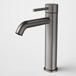 Caroma Liano II mid tower basin mixer in gunmetal, single lever tap with cylindrical base and curved spout