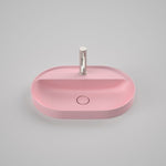 Caroma Liano II oval inset basin in matte pink with 1 tap hole and tap landing, front view