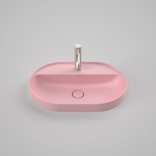 Caroma Liano II oval inset basin in matte pink with 1 tap hole and tap landing, front view