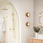Caroma Liano II rail shower with overhead in black, shown in a modern bathroom setting with hand shower and rain head