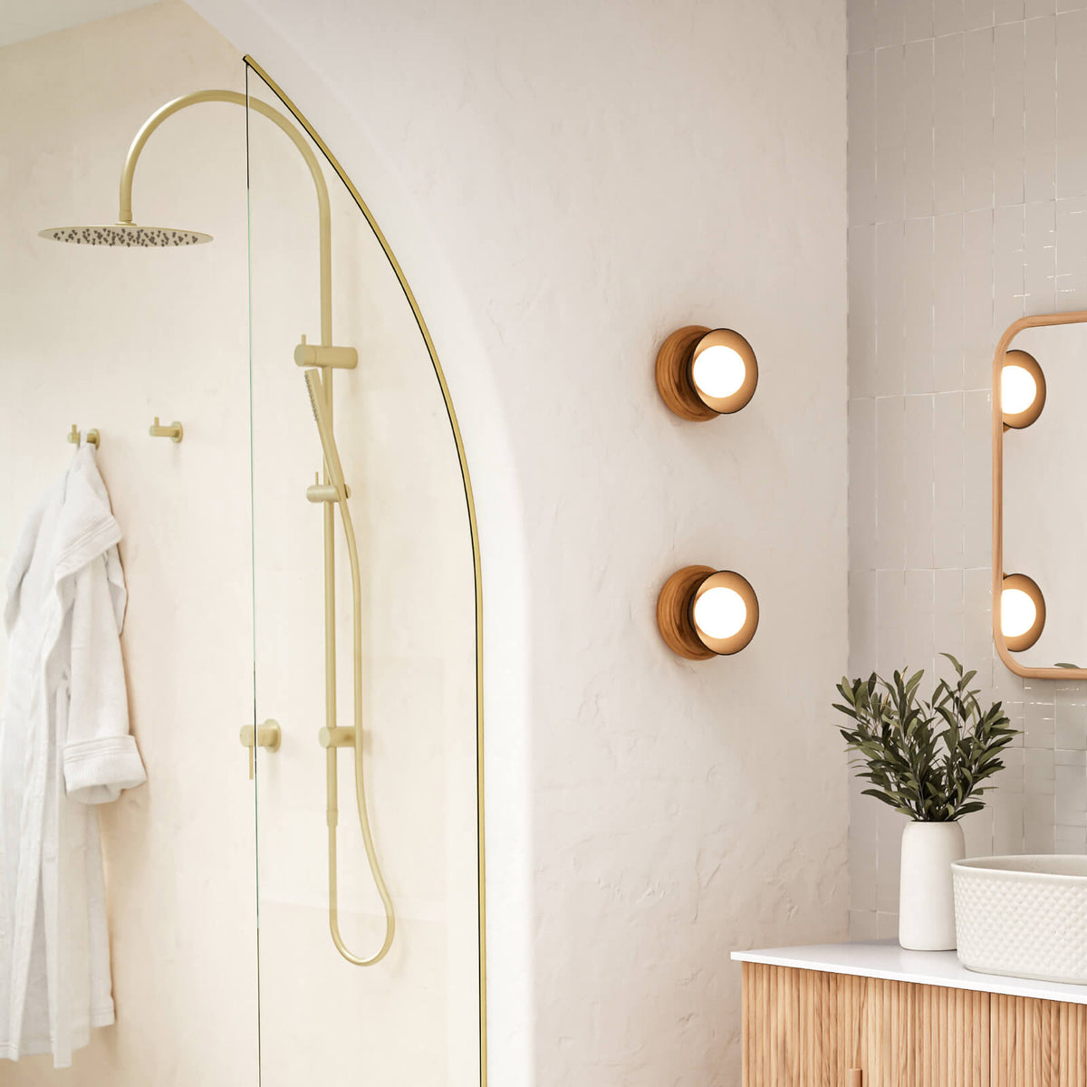 Caroma Liano II rail shower with overhead in black, shown in a modern bathroom setting with hand shower and rain head