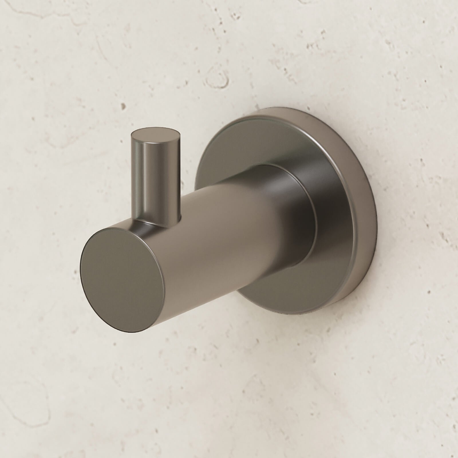 Caroma Liano II gunmetal robe hook with round wall plate on a light stone bathroom wall