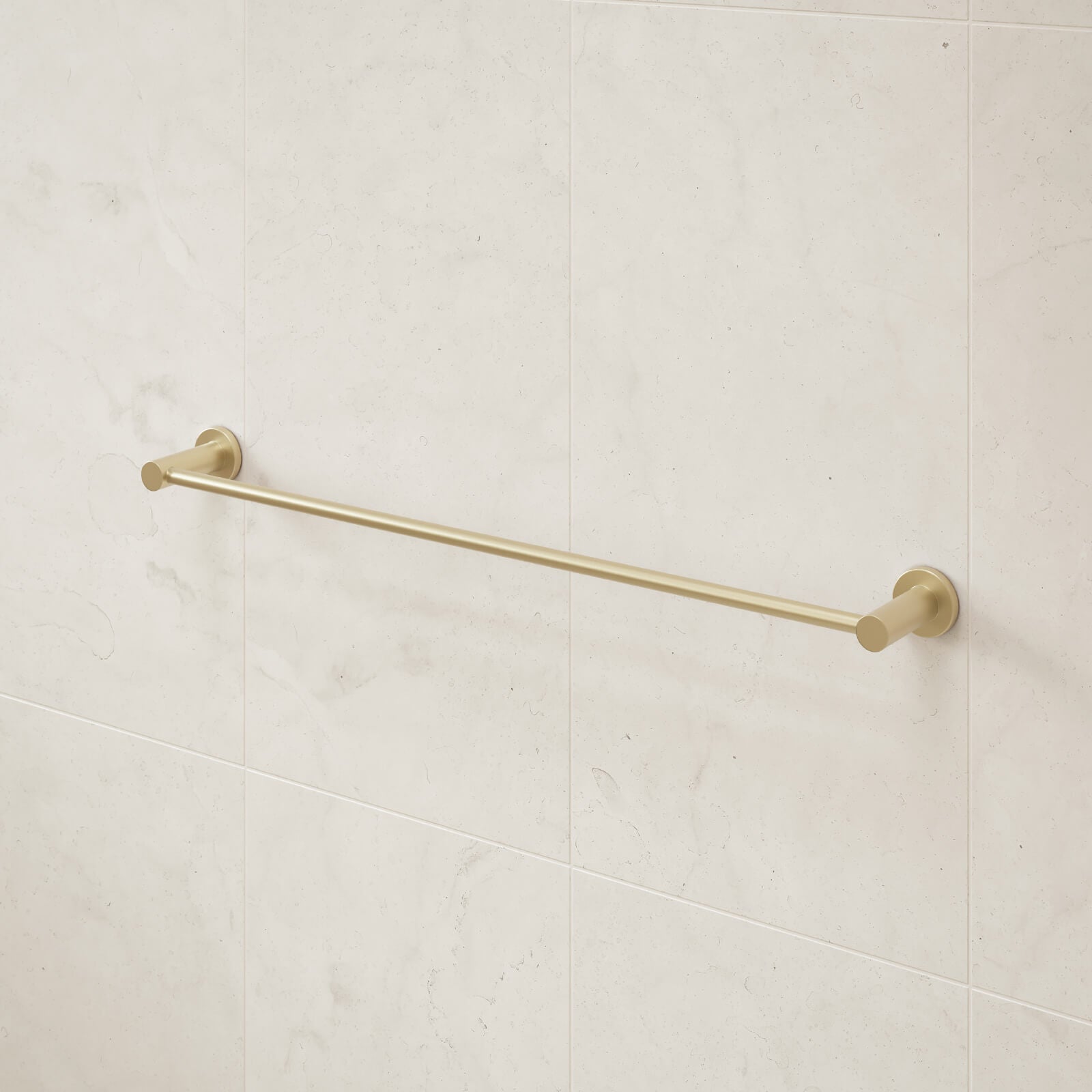 Caroma Liano II single towel rail in brushed brass on a tiled bathroom wall
