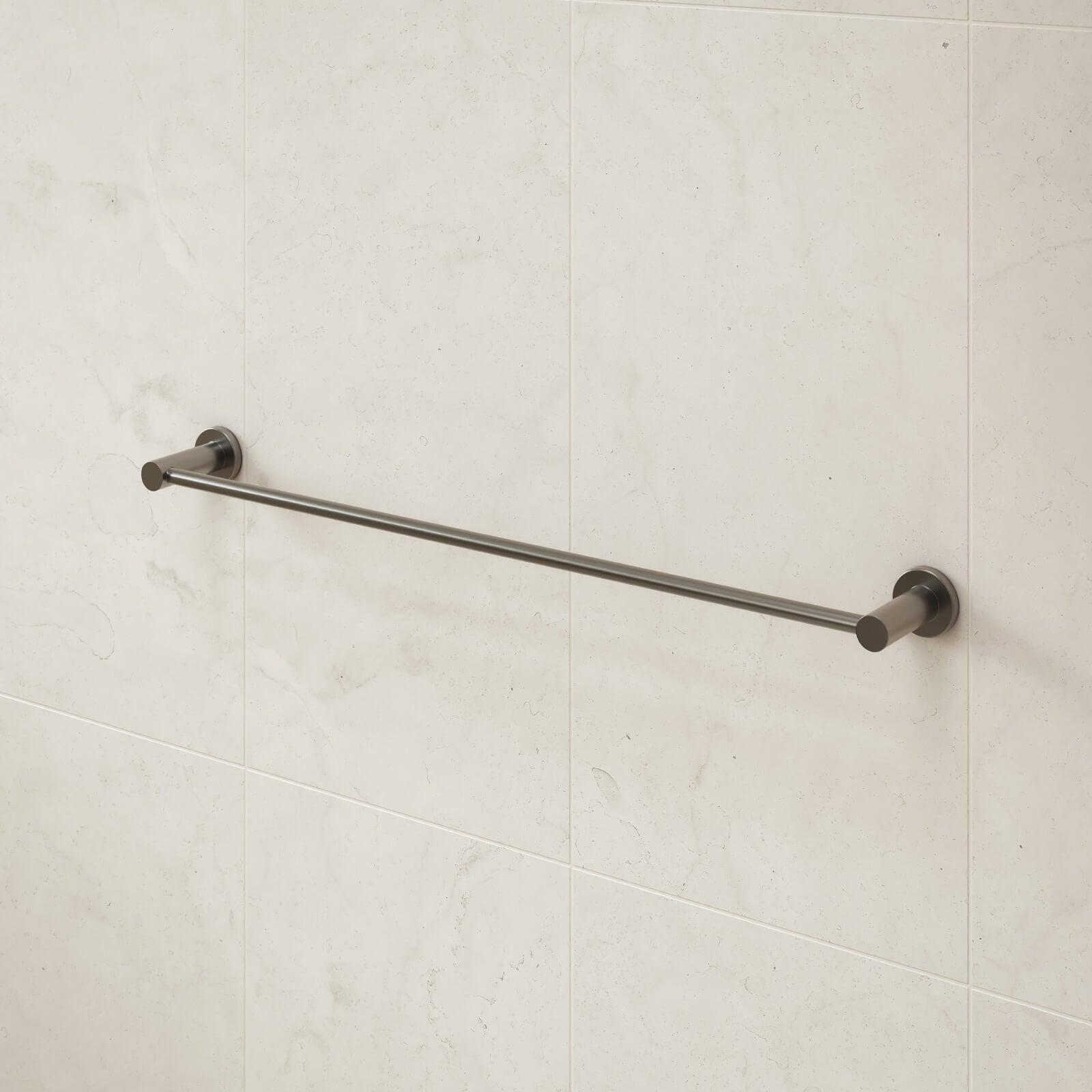 Caroma Liano II single towel rail in gunmetal, mounted on a light tiled bathroom wall.