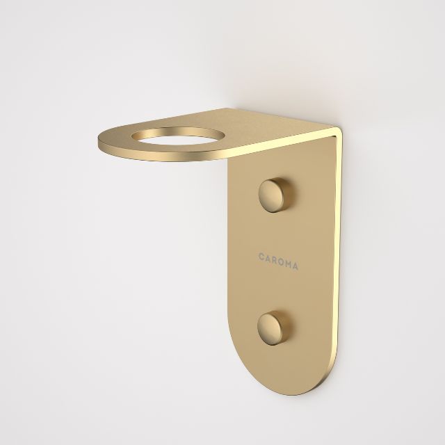 Caroma Liano II brushed brass soap bottle holder, wall-mounted bathroom accessory with round shelf and oval backplate