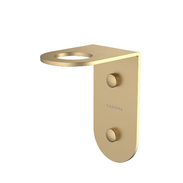 Caroma Liano II soap bottle holder in brushed brass, wall-mounted bathroom accessory with round top ring and fixings viewed on white background