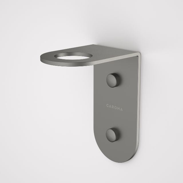 Caroma Liano II gunmetal soap bottle holder, wall-mounted stainless steel bathroom accessory with round opening