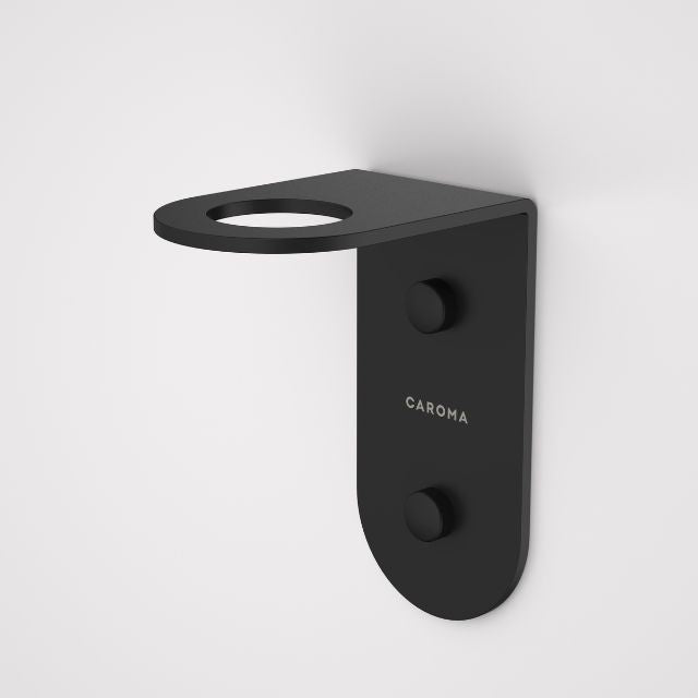 Caroma Liano II matte black wall-mounted soap bottle holder, rounded stainless steel bathroom accessory