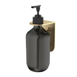 Caroma Liano II brushed brass wall-mounted soap bottle holder with black soap bottle shown front view