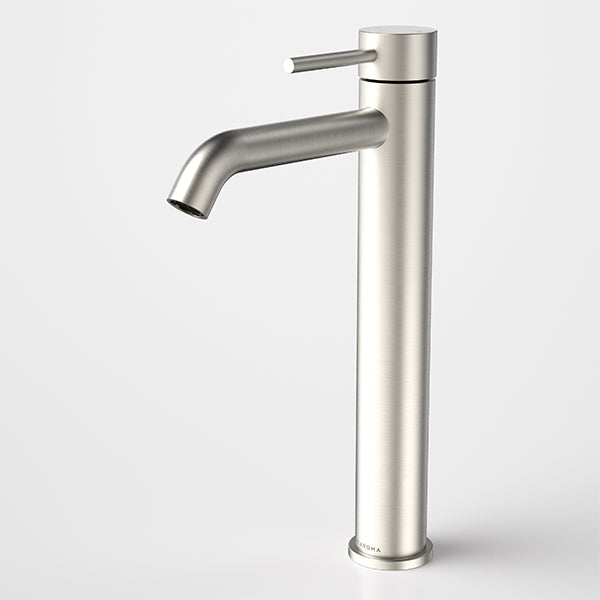 Caroma Liano II tower basin mixer in brushed nickel, tall cylindrical tap with side lever on white background