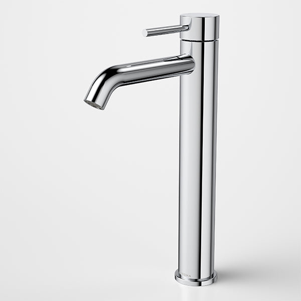 Caroma Liano II tower basin mixer in polished chrome with tall cylindrical body and curved spout