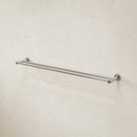 Caroma Liano II double towel rail in chrome, wall-mounted on tiled bathroom wall, two-bar design